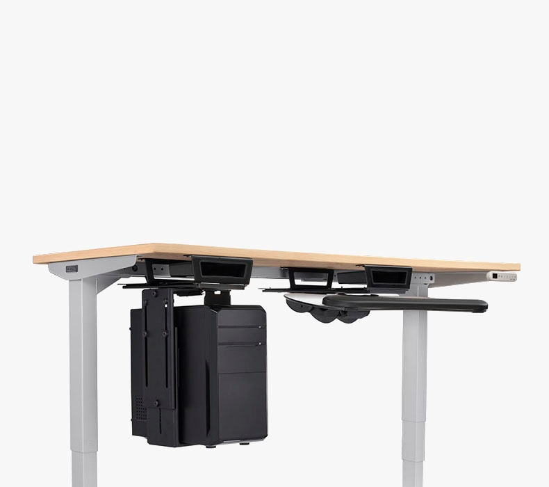 Dual Track Spacers hold a CPU Holder and keyboard tray beneath the desktop