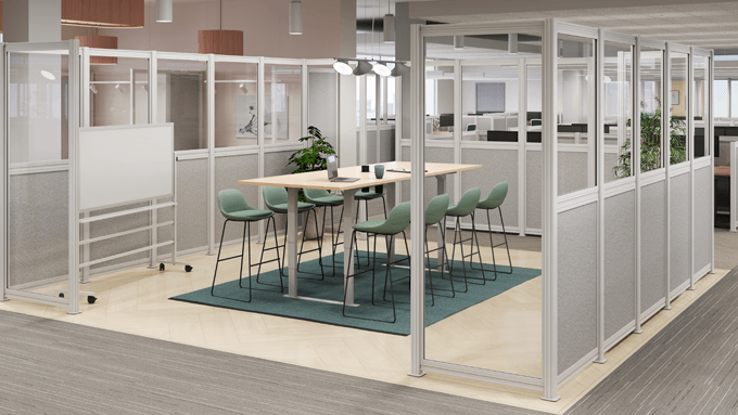 UPLIFT Spaces Wall System creating an open conference area with modular walls containing a UPLIFT Conference table and stools.