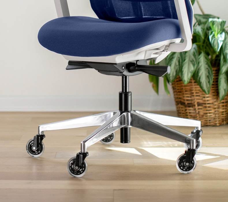 A Cobalt Envoke Ergonomic chair with Blade Casters in an office