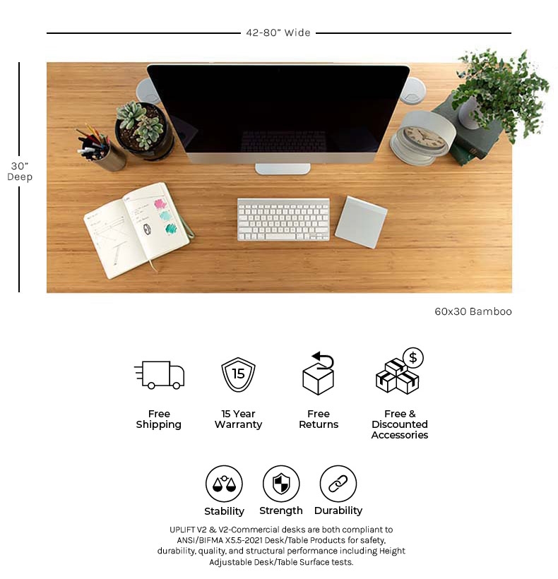 UPLIFT V2 Bamboo Standing Desk with decor