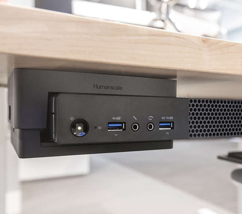 Thin Client Holder is mounted to the support beam of Humanscale's eFloat and Float tables.