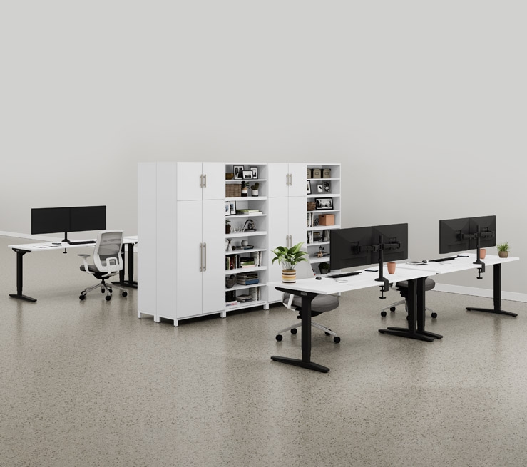 White MoPac Cabinets and Wardrobes create a partition between sit/stand desks
