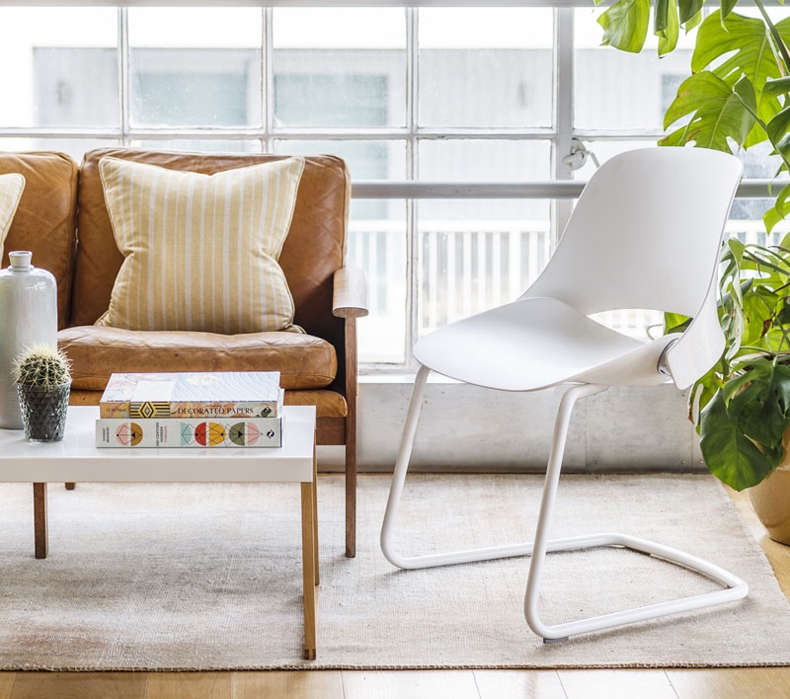A Humanscale Trea Chair in a living room