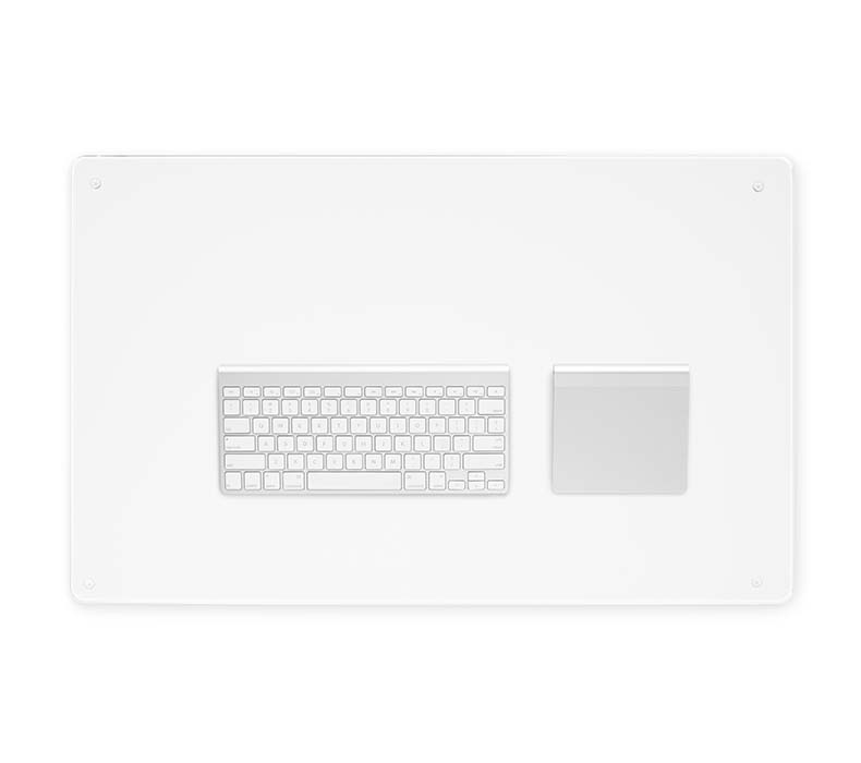 A Glass Desk Blotter with a keyboard and trackpad