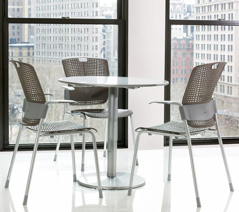 A break area with three Humanscale Cinto Chairs around a table