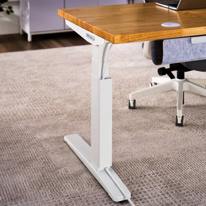 Magnetic Cable Channel by UPLIFT Desk in White attached to a V3 2-Leg Standing Desk