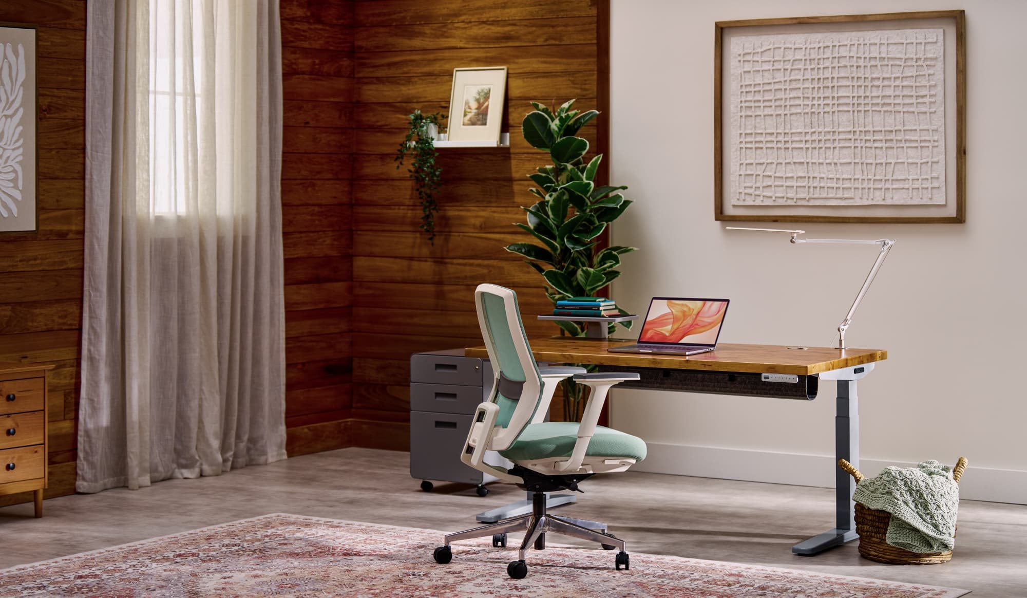 Under desk Foot Hammock attached to an Uplift Standing Desk with Anchor Plates.