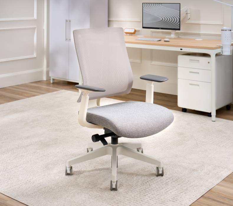 Clarksville Ergonomic Chair by UPLIFT Desk in a cozy home office