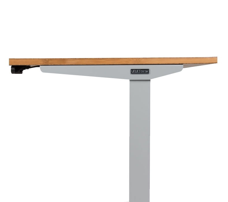 Side view of a V2 Frame with an UPLIFT Desk logo plate