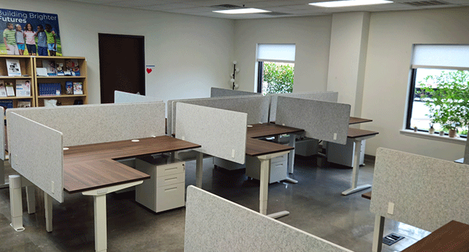 Office space outfitted with corner desks by UPLIFT Desk