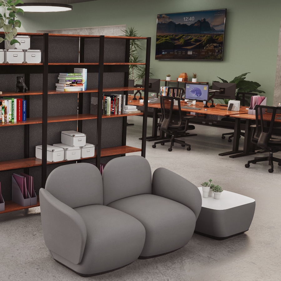Open concept office with shelving and lounge seating provided by UPLIFT Desk.
