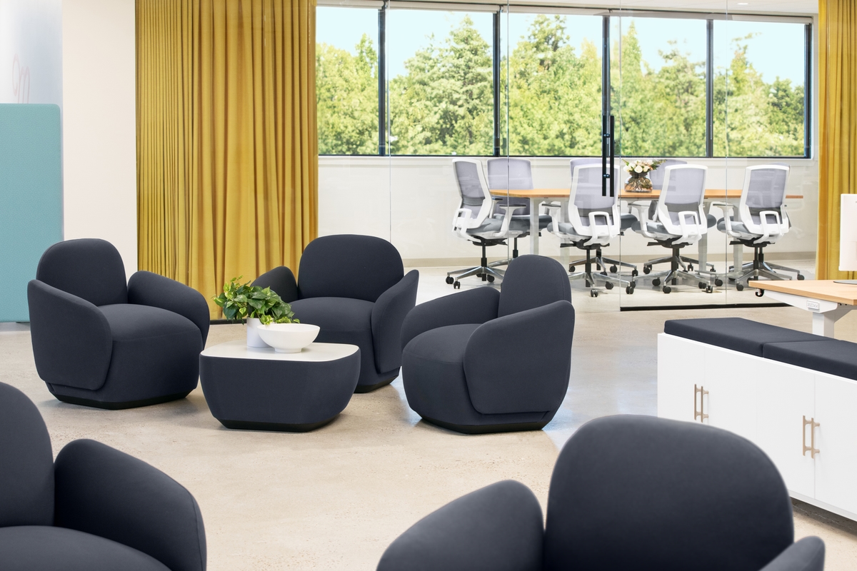 Business office outfitted by the UPLIFT Desk design team with Dillo lounge seating and Envoke ergonomic chairs.