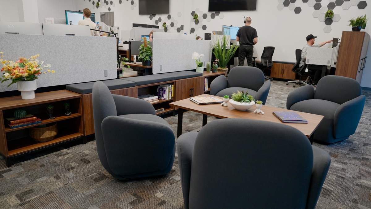 Open concept sales office designed by UPLIFT Desk design services