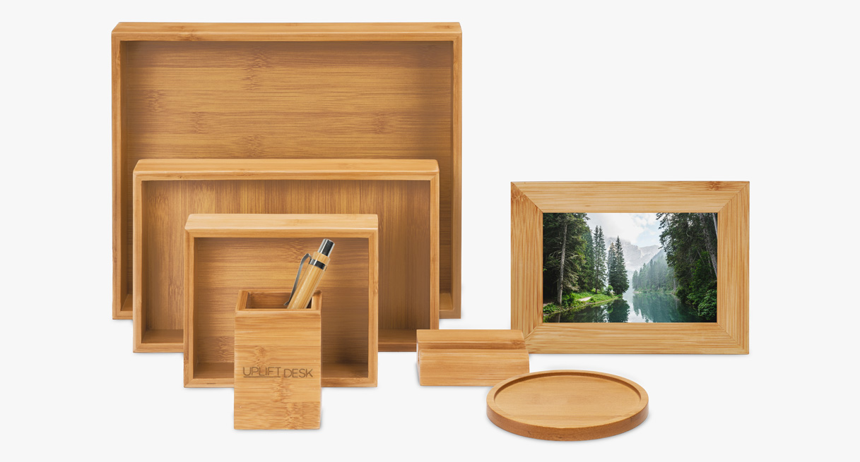 A bamboo desk organizer set to keep your height adjustable desk organized