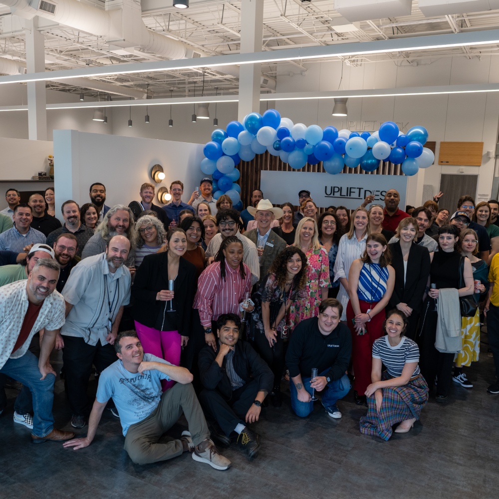 Employees at UPLIFT Desk Austin Showroom