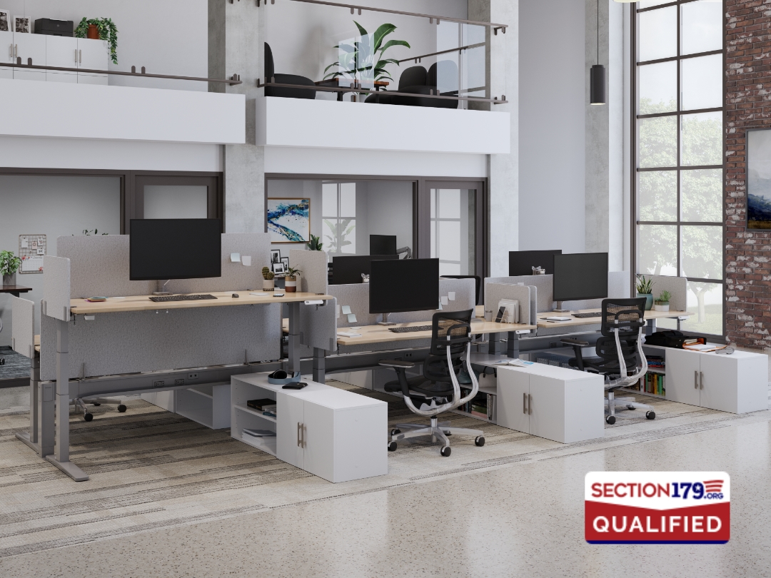 Ergonomic office layout with multiple standing desk workstations