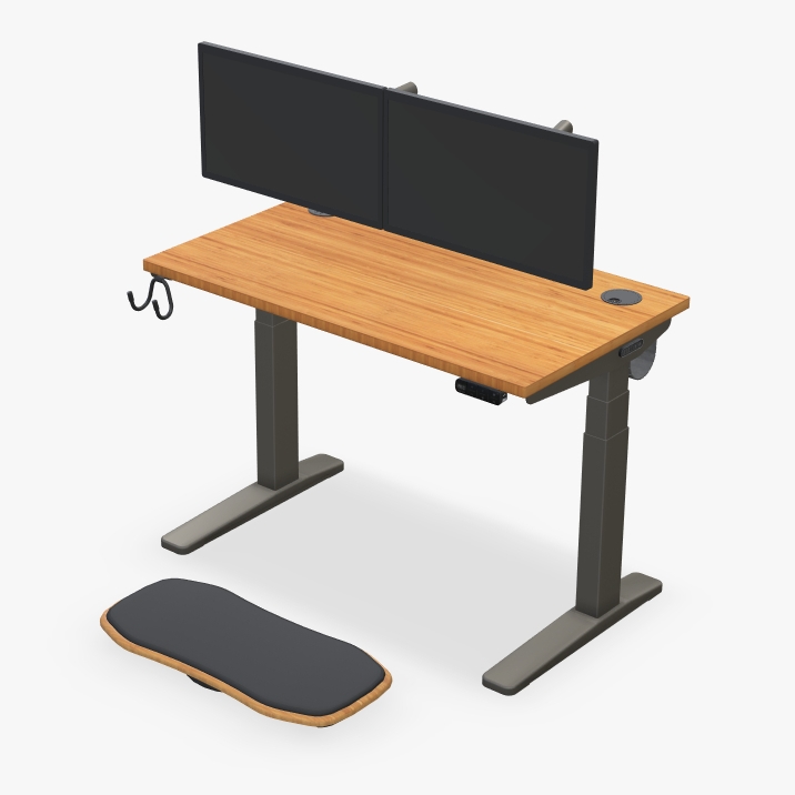 UPLIFT Standing Desk with bamboo desktop and small footprint.