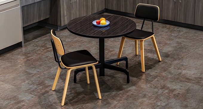 Two Kerbey chairs paired with a Bistro table by UPLIFT Desk