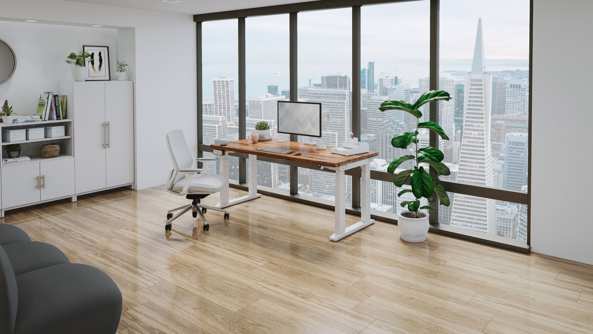 UPLIFT Desk V3 4-Leg Standing Desk in a private architect office overlooking a cityscape.