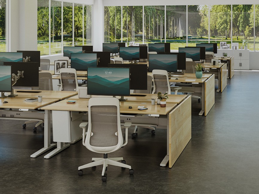 Team office with rows of UPLIFT Standing Desks