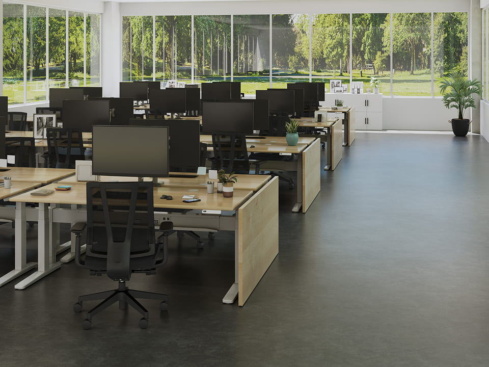 Team office with rows of UPLIFT Standing Desks