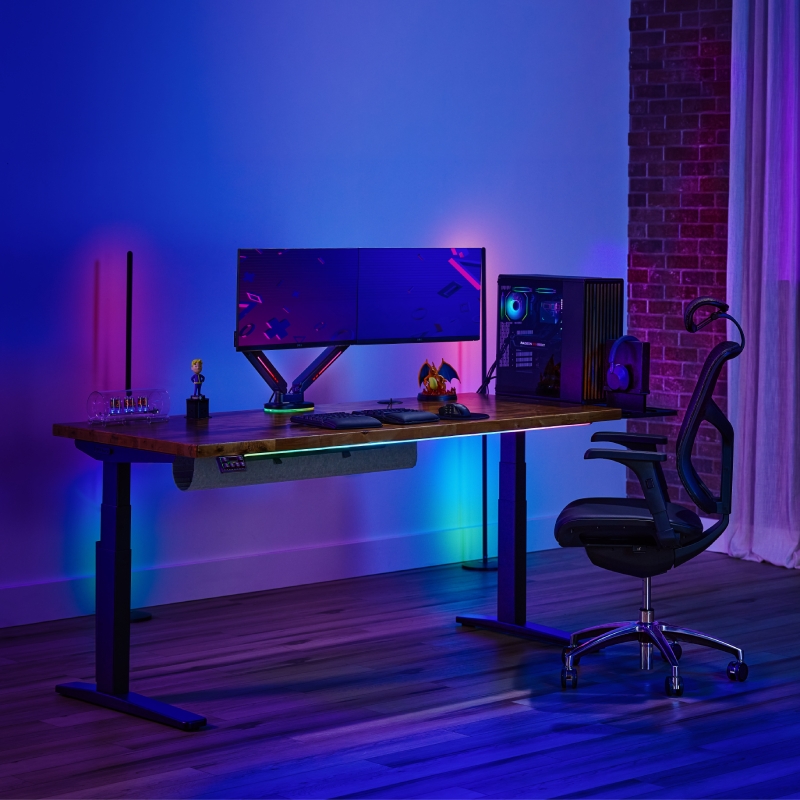 UPLIFT V3 2-leg standing desk with gamer accessories.