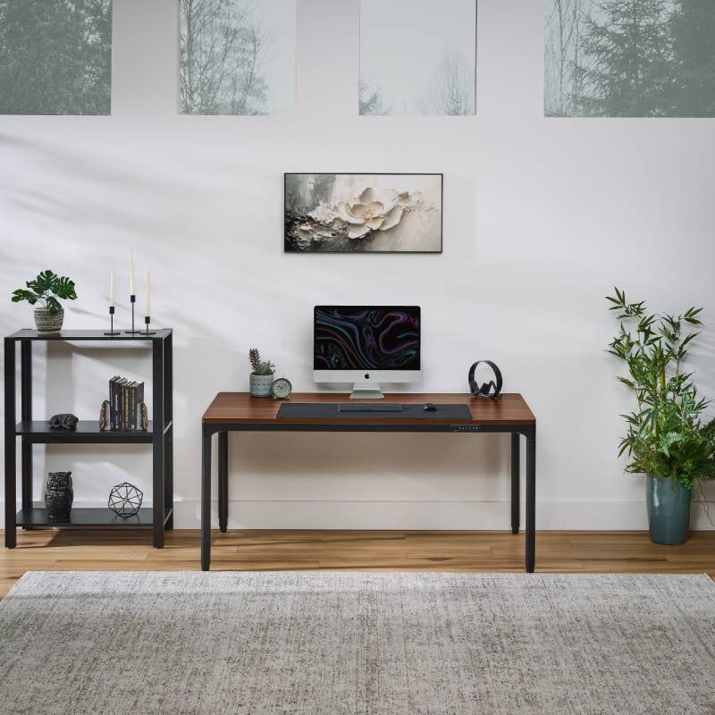 UPLIFT QuadZen Standing Desk in a small home office