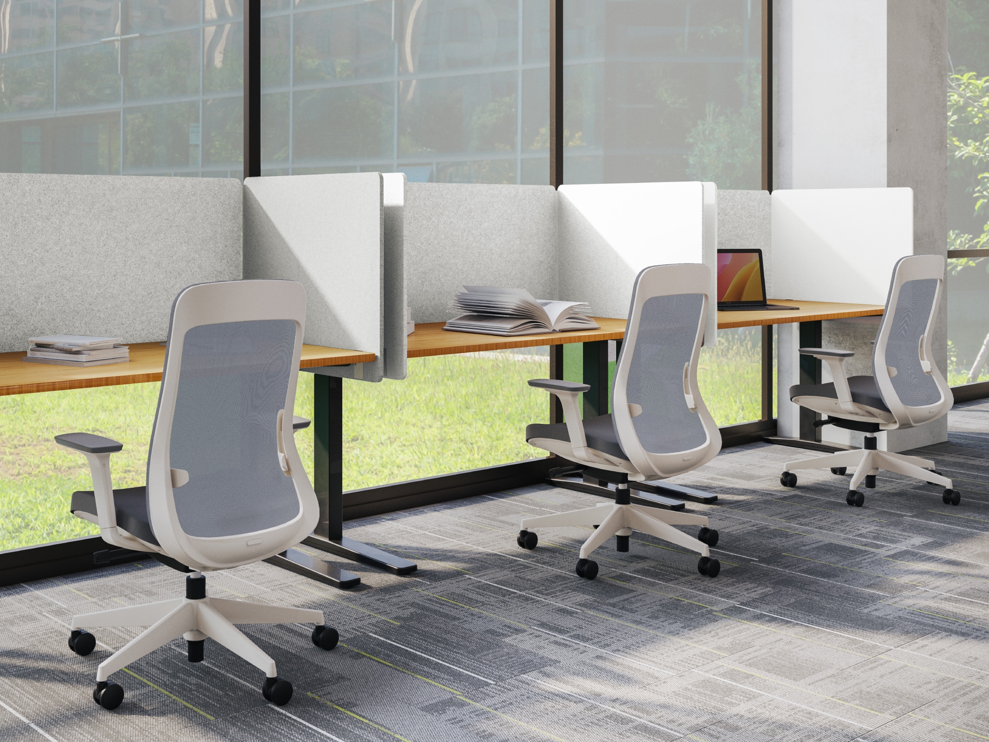 Row of UPLIFT Standing Desks and Bolan Ergonomic Chairs by UPLIFT Desk
