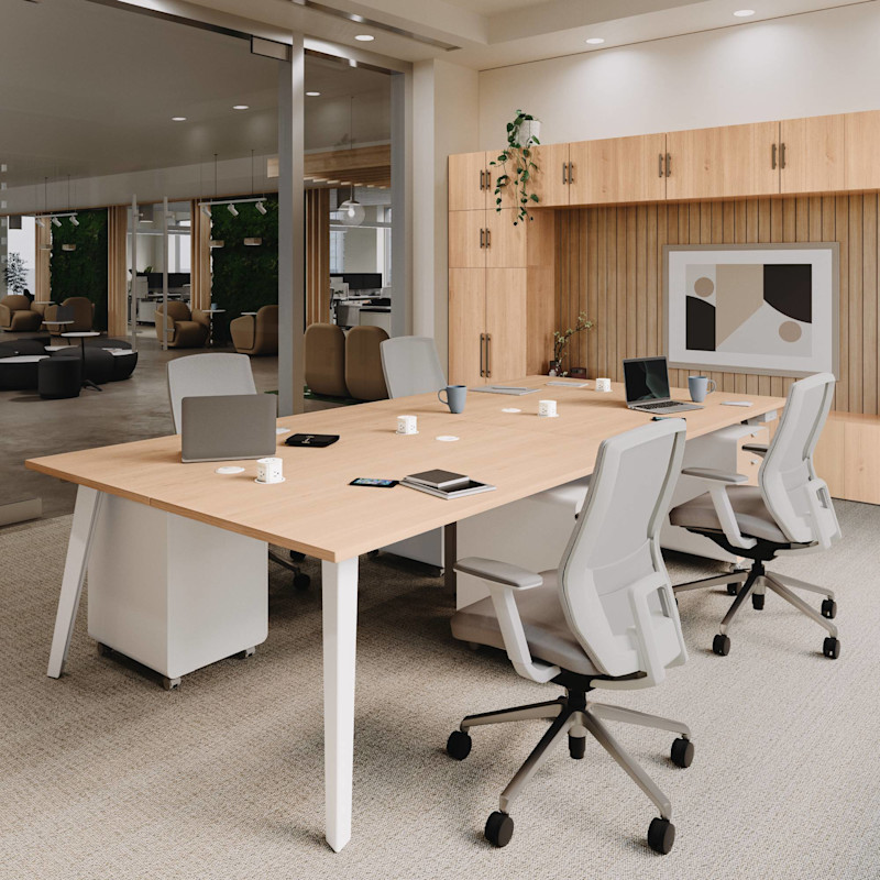 4-Person Table by UPLIFT Desk in Maple Laminate with Envoke Ergonomic Chairs in Fog and matching Maple Laminate MoPac Storage Cabinet