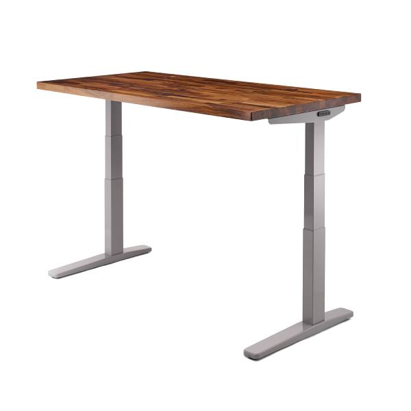 UPLIFT V3 Standing Desk with a gray frame and Walnut Butcher block desktop