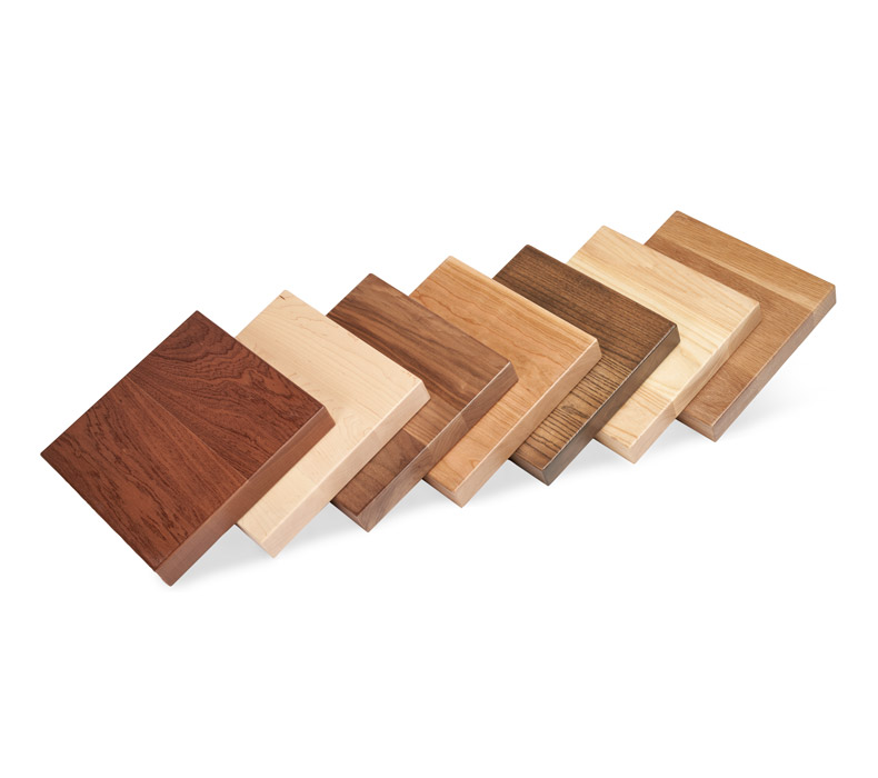 Custom Solid Wood Desktop Samples standing up in a row