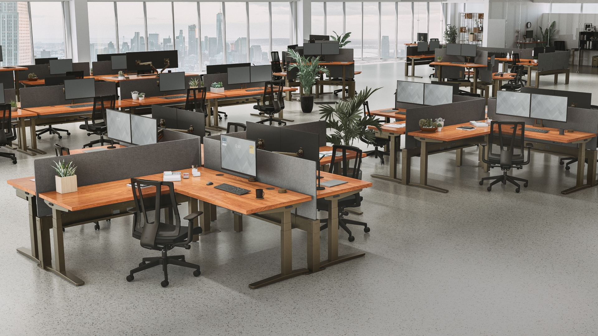 Large startup office outfitted with L-Shaped Standing Desks and acoustic panels by UPLIFT Desk