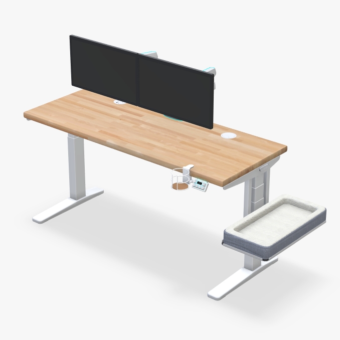 UPLIFT height-adjustable desk with a birch butcher block desktop and light colored cozy accessories.