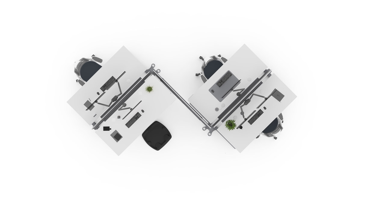 Four standing desks for chairs and computers arranged in the herringbone configuration