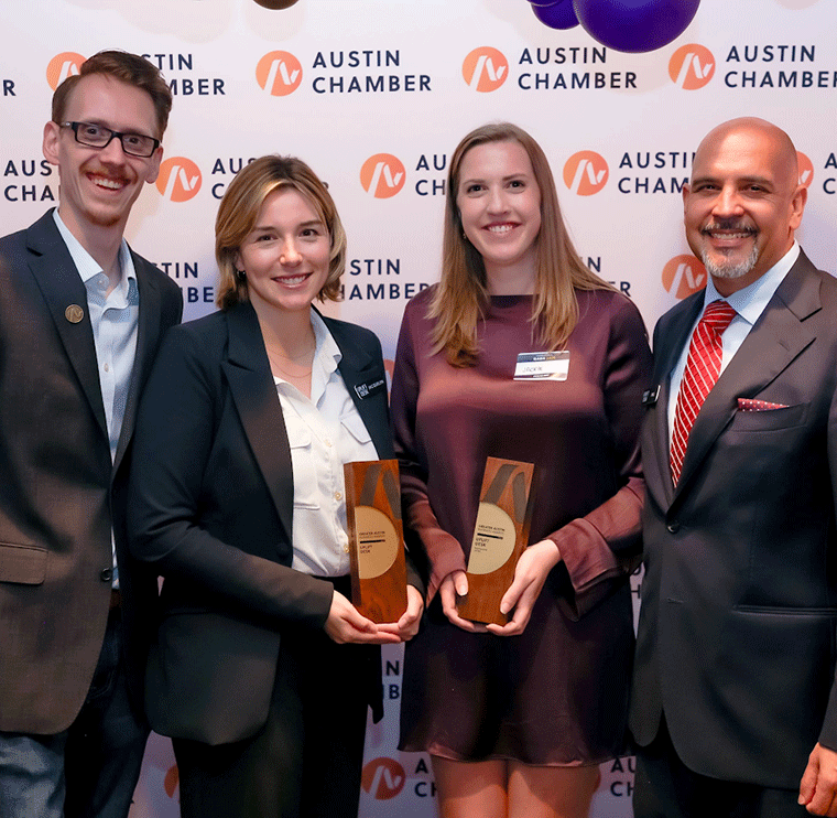 UPLIFT Desk employees receiving awards from Austin Chamber