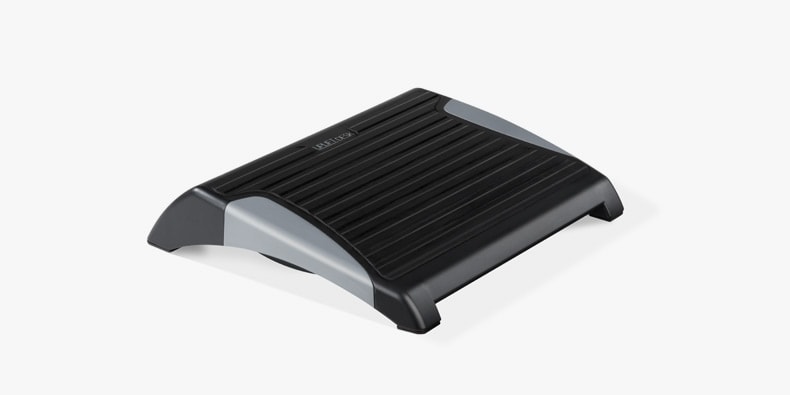 An ergonomic adjustable footrest by UPLIFT Desk