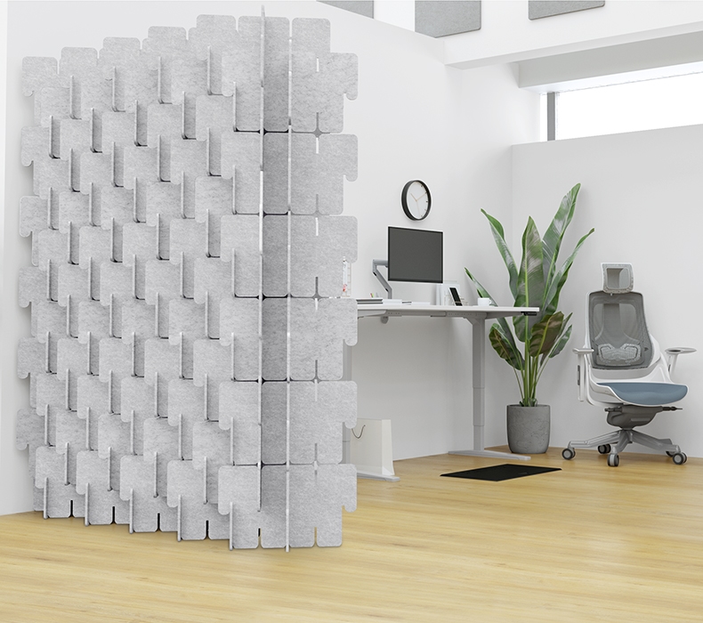 A Bonnell Acoustic Puzzle wall reduces noise for a semi-private corner office