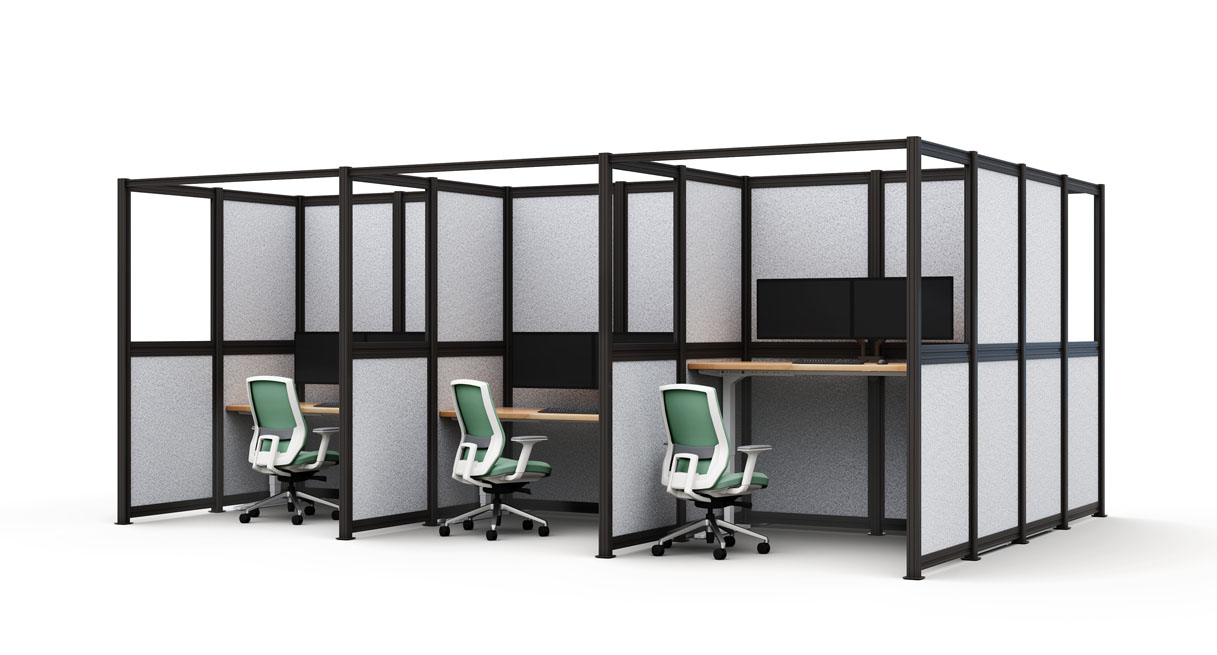 Office partitions created using UPLIFT Spaces Wall System featuring standing desks, monitors, and Sage UPLIFT Envoke Chairs