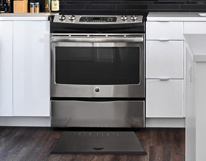 The anti-fatigue mat shown in front of an oven in the kitchen
