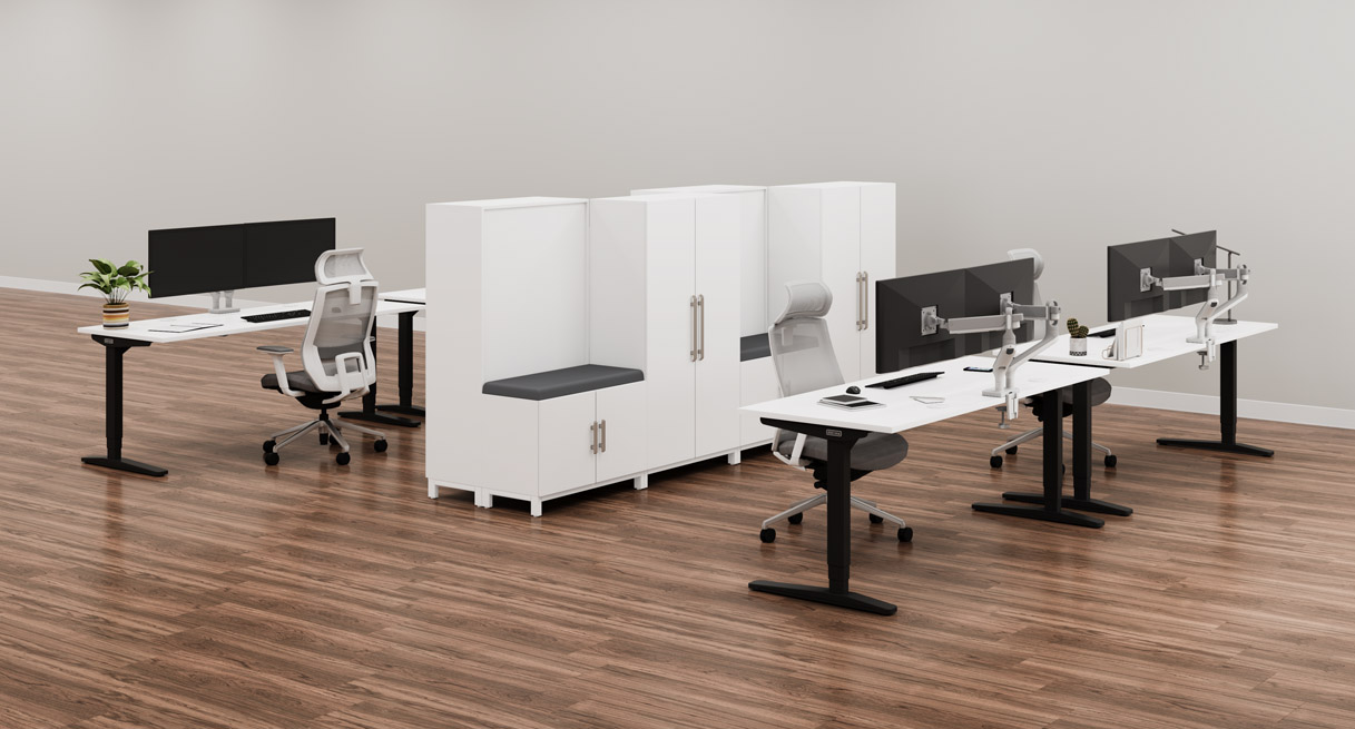A white MoPac Wardrobe and Cabinet configuration creates a partition between two rows of matching white UPLIFT Standing Desks