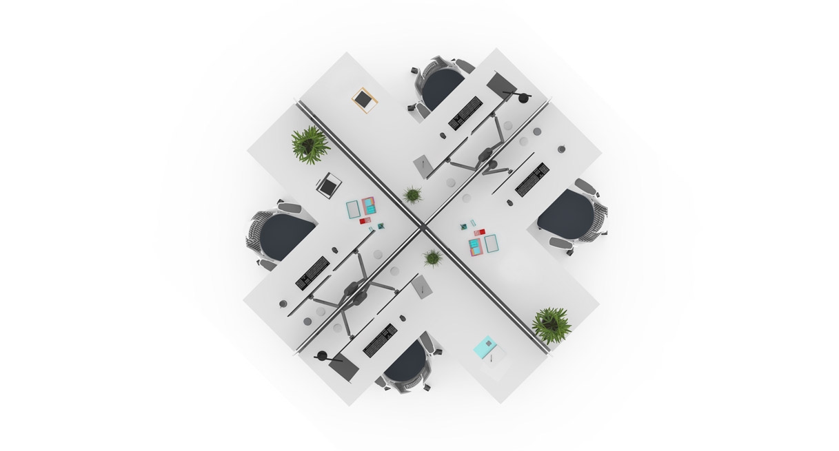Looking down at four desks arranged in the 4-pack configuration
