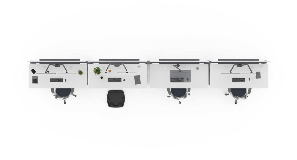 Looking down at four desks arranged in the single sided row configuration