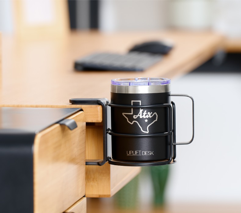 An insulated mug in a Clamp-On Cup Holder