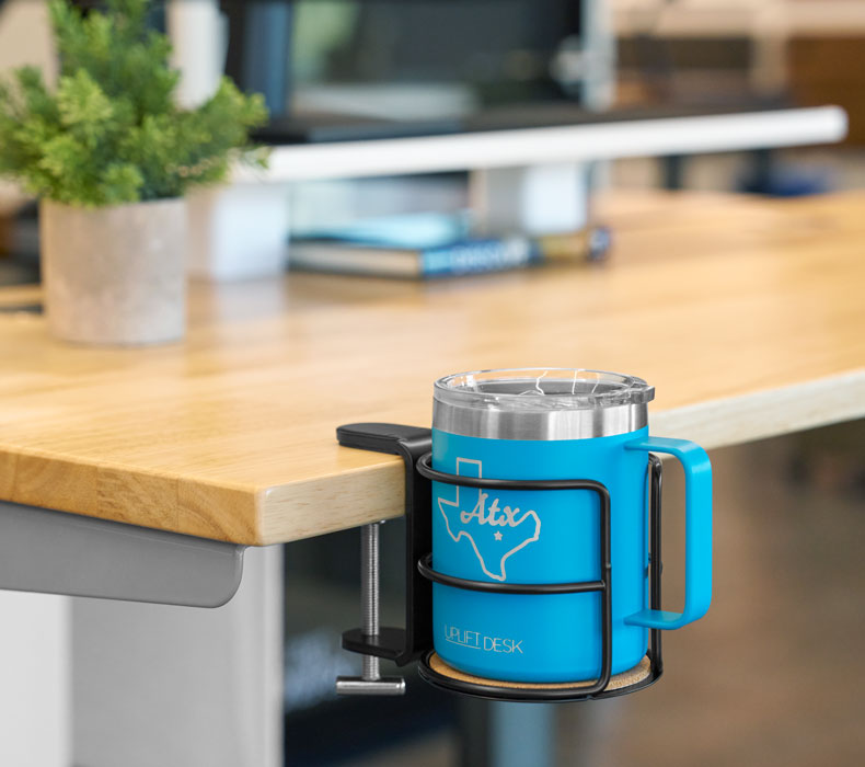An insulated mug in a Clamp-On Cup Holder