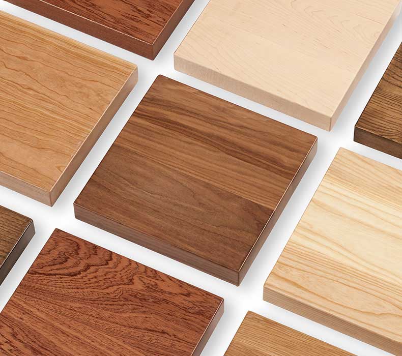 Custom Solid Wood Desktop Samples lying flat on a white background