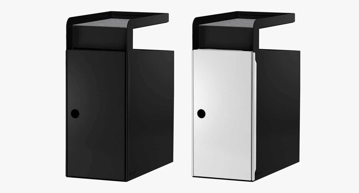 Two black storage cubbies, one with a matching black door, and one with a contrasting white door