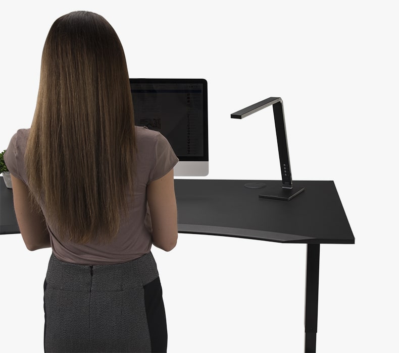 A center cutout on the Eco Curve desktop allows users to reach more of their workspace.