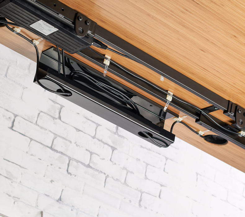 Desk Frame Wire Management Tray attached to a Bamboo UPLIFT Desk