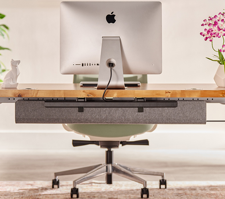 Front view of the UPLIFT V3 Standing desk prominently featuring the integrated FlexMount Cable Manager