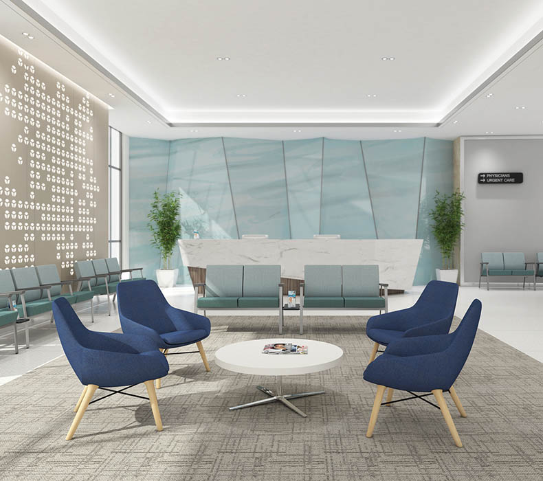 Blue Lilly Lounge Chairs with wooden bases around a low table in a reception area